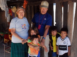 Ayoreo family in the Gran Chaco in Paraguay.  This family and their community were forcibly relocated from their homeland by groups who want to exploit the Chaco.  Photolangelle.org
